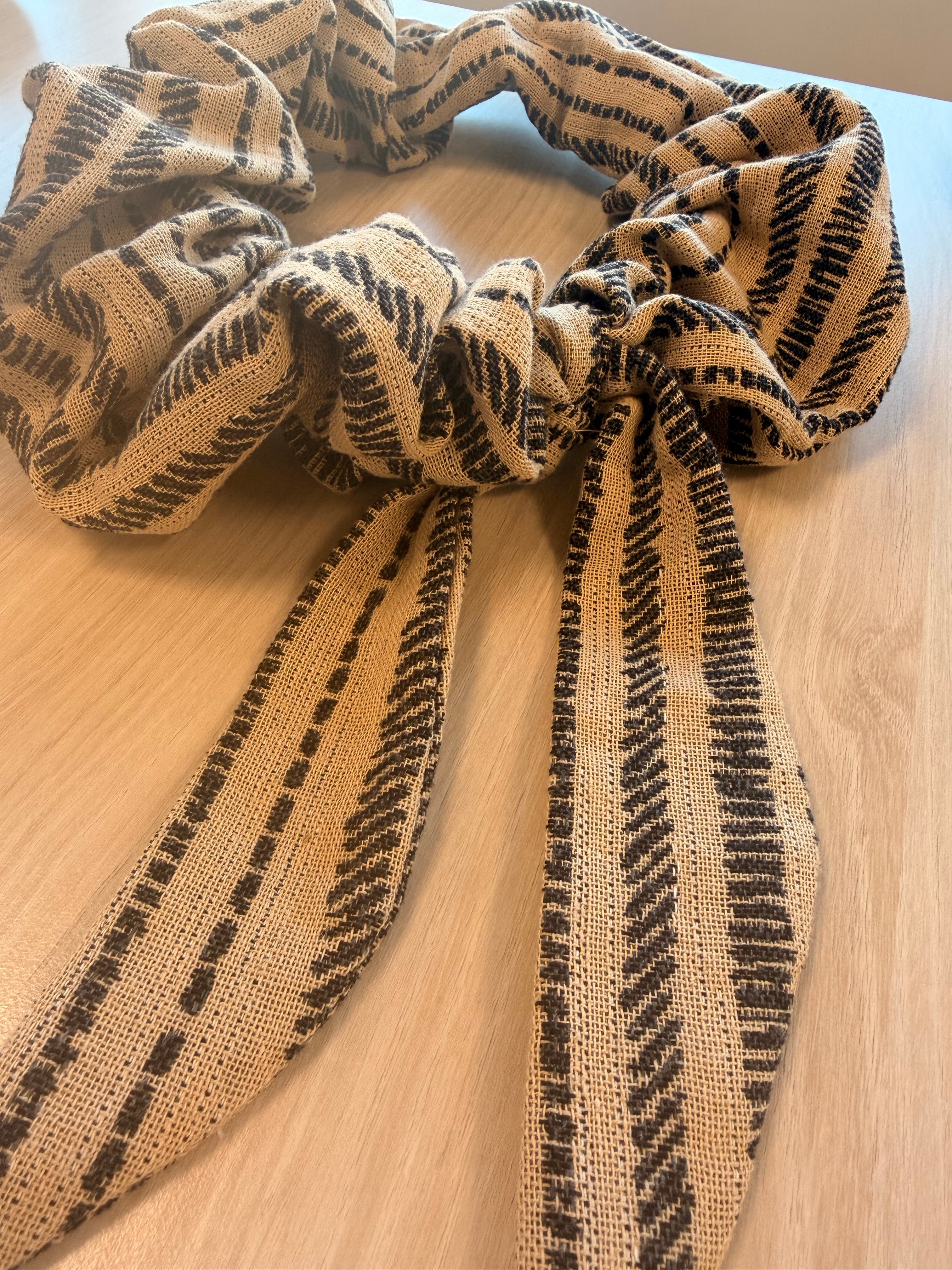 Colensuá arena y negro